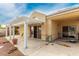 A covered patio with a pergola, and a backyard perfect for entertaining guests at 344 Mill Hollow Rd, Las Vegas, NV 89107