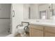 Bathroom with walk-in shower and comfort-height toilet and sink at 344 Mill Hollow Rd, Las Vegas, NV 89107