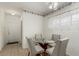Cozy dining area with a glass-top table and seating for four at 344 Mill Hollow Rd, Las Vegas, NV 89107