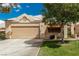 Charming single-story home featuring a well-maintained front yard and a two-car garage at 344 Mill Hollow Rd, Las Vegas, NV 89107