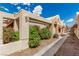Attractive single-story home exterior showcasing desert landscaping and community charm at 344 Mill Hollow Rd, Las Vegas, NV 89107