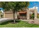 Single-story home featuring desert landscaping and a convenient two-car garage at 344 Mill Hollow Rd, Las Vegas, NV 89107