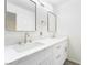 Bright bathroom featuring a double sink vanity with modern fixtures at 3540 Estes Park Dr, Las Vegas, NV 89122