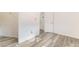 Bedroom with new floors, white doors, and trim at 3540 Estes Park Dr, Las Vegas, NV 89122