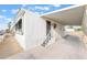 Well-kept home featuring awnings, a small porch and easy access to a fenced-in yard at 3540 Estes Park Dr, Las Vegas, NV 89122