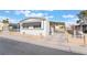 Charming single-story home featuring awnings, low fencing, and a well-maintained front yard at 3540 Estes Park Dr, Las Vegas, NV 89122