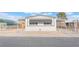 Charming single-story home featuring awnings, low fencing, and well-maintained front yard at 3540 Estes Park Dr, Las Vegas, NV 89122
