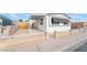 Charming single-story home featuring awnings, low fencing, and a well-maintained front yard at 3540 Estes Park Dr, Las Vegas, NV 89122