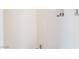Empty room with white walls and connections for washer and dryer units at 3540 Estes Park Dr, Las Vegas, NV 89122