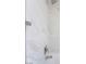Close up of the shower with marble tile walls and brushed nickel fixtures at 3540 Estes Park Dr, Las Vegas, NV 89122