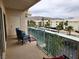 Enjoy serene mountain views from this spacious balcony featuring comfortable seating and stylish decor at 3550 Bay Sands Dr # 3077, Laughlin, NV 89029