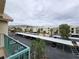 Exterior view showcases ample parking with covered spaces, well-maintained landscaping and building facade at 3550 Bay Sands Dr # 3077, Laughlin, NV 89029