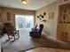Cozy living room features sliding glass doors and comfortable seating arrangements at 3550 Bay Sands Dr # 3077, Laughlin, NV 89029