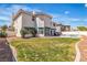 The backyard includes a grassy area, privacy wall, rock garden, and a private pool area at 3604 N Campbell Rd, Las Vegas, NV 89129