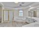 Large bathroom featuring a glass shower, soaking tub, and double sink vanity at 3604 N Campbell Rd, Las Vegas, NV 89129