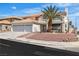 Beautiful two-story home showcasing manicured landscaping, mature palm trees, and a spacious three-car garage at 3604 N Campbell Rd, Las Vegas, NV 89129
