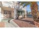 Welcoming front entrance with a beautiful double door entry, shaded window, and mature landscaping at 3604 N Campbell Rd, Las Vegas, NV 89129