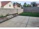 The backyard offers an updated concrete patio, low maintenance artificial turf, and block wall fencing at 3616 Rose Canyon Dr, North Las Vegas, NV 89032