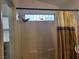 Clean bathroom with a shower/tub combo, white tile, and natural light at 3616 Rose Canyon Dr, North Las Vegas, NV 89032