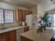 Functional kitchen with a center island, ample storage, and a bright, inviting atmosphere at 3616 Rose Canyon Dr, North Las Vegas, NV 89032