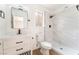 Modern bathroom with a walk-in shower, a white vanity and new fixtures at 3915 Delling Ct, Las Vegas, NV 89104
