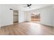 Large bedroom featuring wood-look floors, closet, and access to the backyard at 3915 Delling Ct, Las Vegas, NV 89104