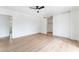 Bedroom with wood-look floors, closet, and door leading to another room at 3915 Delling Ct, Las Vegas, NV 89104