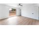 Light filled bedroom with a ceiling fan and a sliding glass door to the backyard at 3915 Delling Ct, Las Vegas, NV 89104