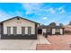Charming single-story home featuring a unique exterior, well-manicured yard, and inviting entrance at 3915 Delling Ct, Las Vegas, NV 89104