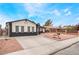 Inviting single-story house with a well-kept yard, neat design, and convenient driveway at 3915 Delling Ct, Las Vegas, NV 89104