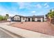 Attractive single-story home showcasing unique yard and well-maintained landscaping at 3915 Delling Ct, Las Vegas, NV 89104