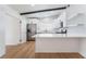 Spacious kitchen with stainless steel appliances, quartz countertops, and an open layout at 3915 Delling Ct, Las Vegas, NV 89104