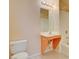 Bathroom featuring tile flooring, a single sink vanity, toilet and a shower and bathtub combo at 43 E Agate Ave # 305, Las Vegas, NV 89123
