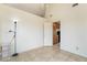 Bedroom with high ceilings and an open doorway to the kitchen at 4712 Belshire Dr, Las Vegas, NV 89147