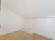 Bright closet with carpet floors and a long white clothing rack at 4712 Belshire Dr, Las Vegas, NV 89147
