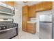 Well-equipped kitchen featuring stainless steel refrigerator and modern appliances at 4712 Belshire Dr, Las Vegas, NV 89147