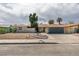 Charming single-story home with a well-manicured front yard and an attached two-car garage at 4855 San Sebastian Ave, Las Vegas, NV 89121