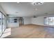 Open living room area with light wood floors and backyard views at 4855 San Sebastian Ave, Las Vegas, NV 89121