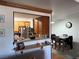 View of kitchen pass-through, dining area, and stainless refrigerator at 5055 W Hacienda Ave # 2175, Las Vegas, NV 89118
