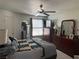 Spacious bedroom featuring a ceiling fan, a large window, and coordinating furniture set at 5055 W Hacienda Ave # 2175, Las Vegas, NV 89118