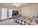 Inviting bedroom with french doors, a ceiling fan, and twin beds at 5093 Sun Valley Dr, Las Vegas, NV 89122