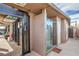 The backyard showcases an outdoor shower next to the utility access doors at 5093 Sun Valley Dr, Las Vegas, NV 89122