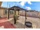 Outdoor gazebo featuring a table and chairs, perfect for backyard gatherings and outdoor entertaining at 5093 Sun Valley Dr, Las Vegas, NV 89122