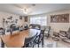 Inviting living room features neutral walls, wood-look floors, and comfortable seating arrangement at 5093 Sun Valley Dr, Las Vegas, NV 89122