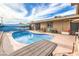 Outdoor swimming pool surrounded by a patio, offering a relaxing backyard oasis at 5093 Sun Valley Dr, Las Vegas, NV 89122