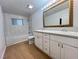 Elegant bathroom features double vanity with granite countertops and tiled shower at 524 Bedford Rd, Las Vegas, NV 89107