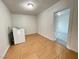 Laundry room with neutral tile floor and a white washing machine at 524 Bedford Rd, Las Vegas, NV 89107
