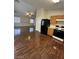 Efficient kitchen with a gas range, wood cabinets, and updated appliances at 5433 Bridgehampton Ave, Las Vegas, NV 89130