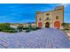 Gorgeous home featuring arched doorways and desert landscaping at 6 Lilla Rosa St, Henderson, NV 89011