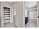 Hallway view showcasing bathroom with shower/tub combo and linen closet across from doorway at 6 Lilla Rosa St, Henderson, NV 89011
